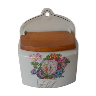 Saltbox in earthenware flowers cover wood