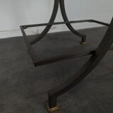 Neoclassical side table in wrought iron and eglomisé glass.