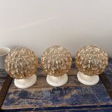 Trio of golden globe wall or ceiling lights