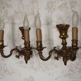 Pair of French baroque brass wall sconces with two branches, decorated with acanthus and wickerwork.