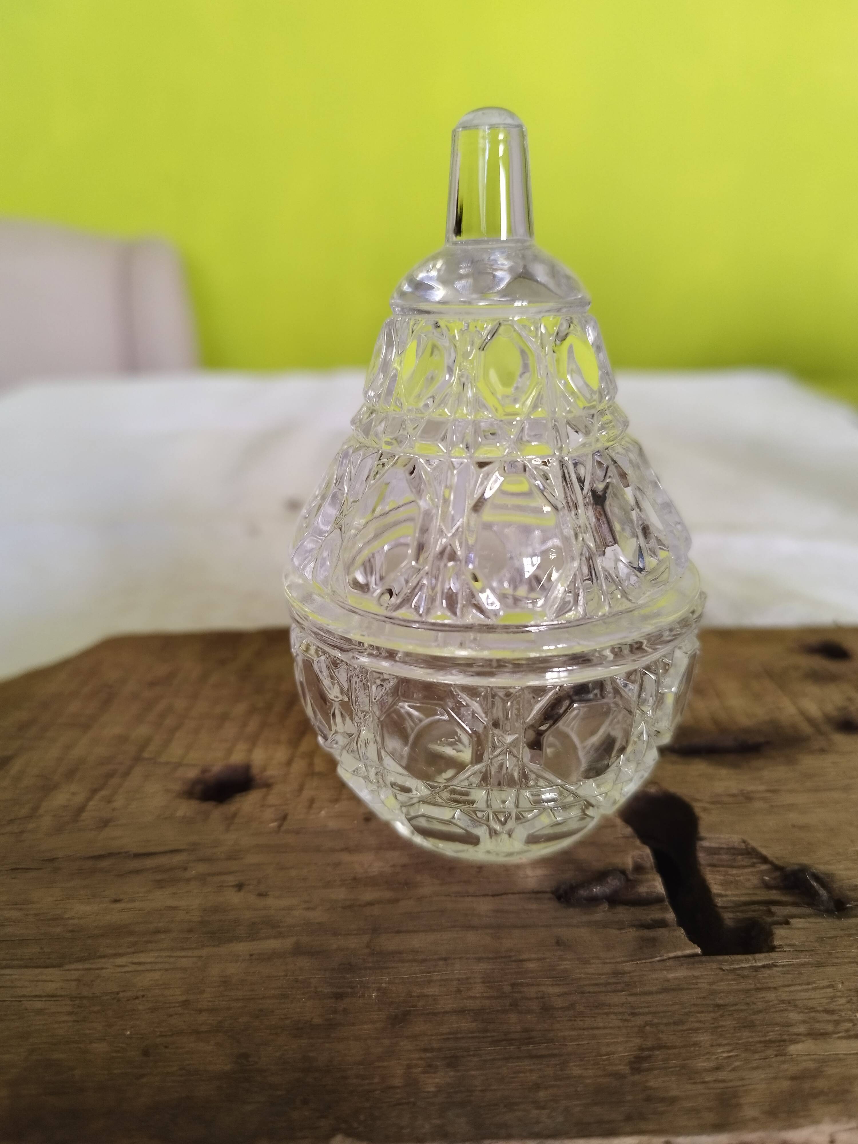 Small pear-shaped chiseled glass jar