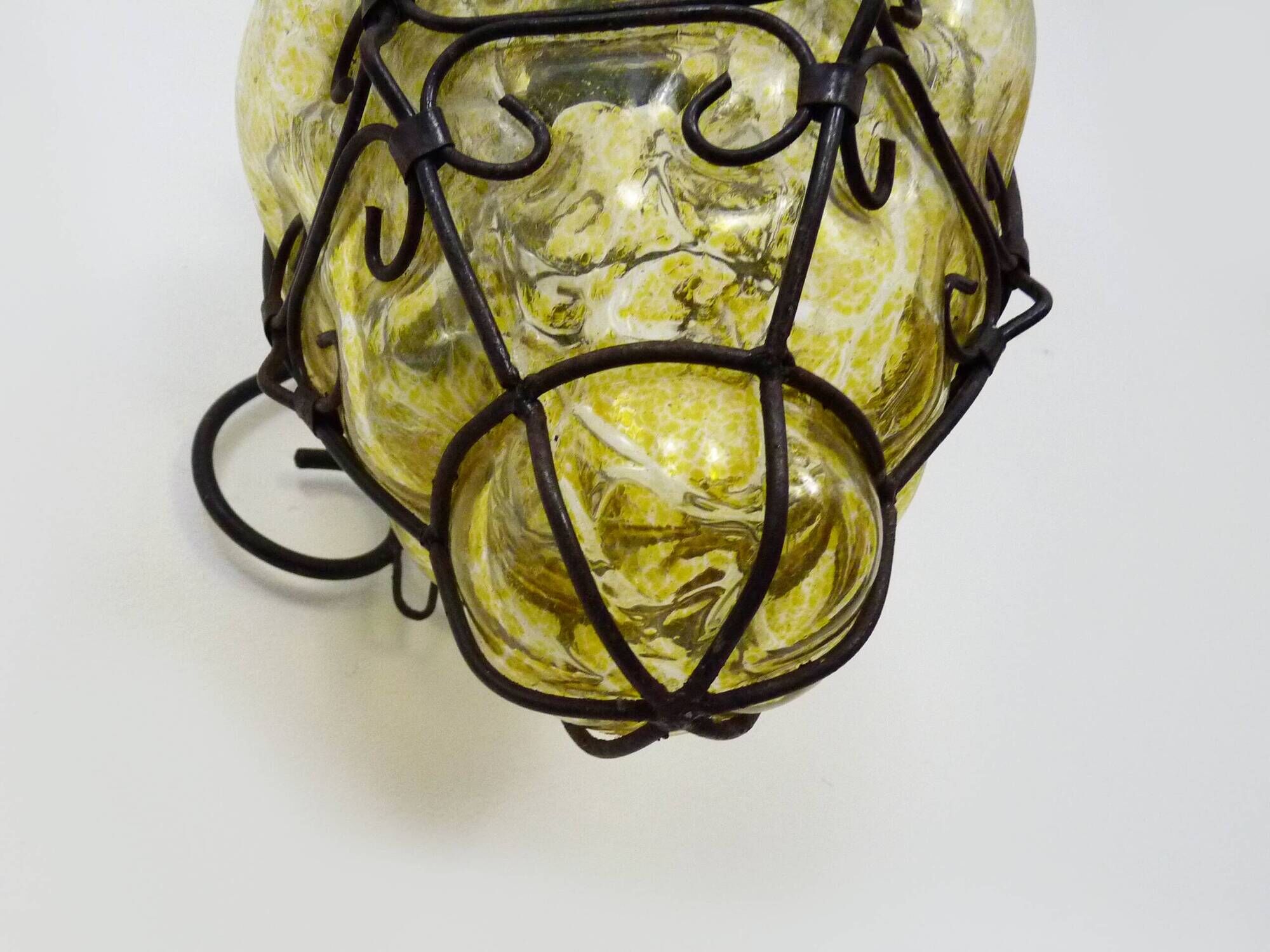Vintage Italian wall light in transparent yellow blown glass and wrought iron. 70s 80s