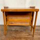 Modernist vintage chest of drawers in light chene has 3 drawers rattan top changing table