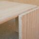 Table basse vintage en travertin par les éditions Roche Bobois