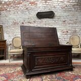 Chest in carved natural wood of the eighteenth century