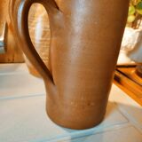 Duo of pitchers water, wine