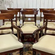 Set of 2 armchairs and 6 English mahogany chairs from the 1950s.