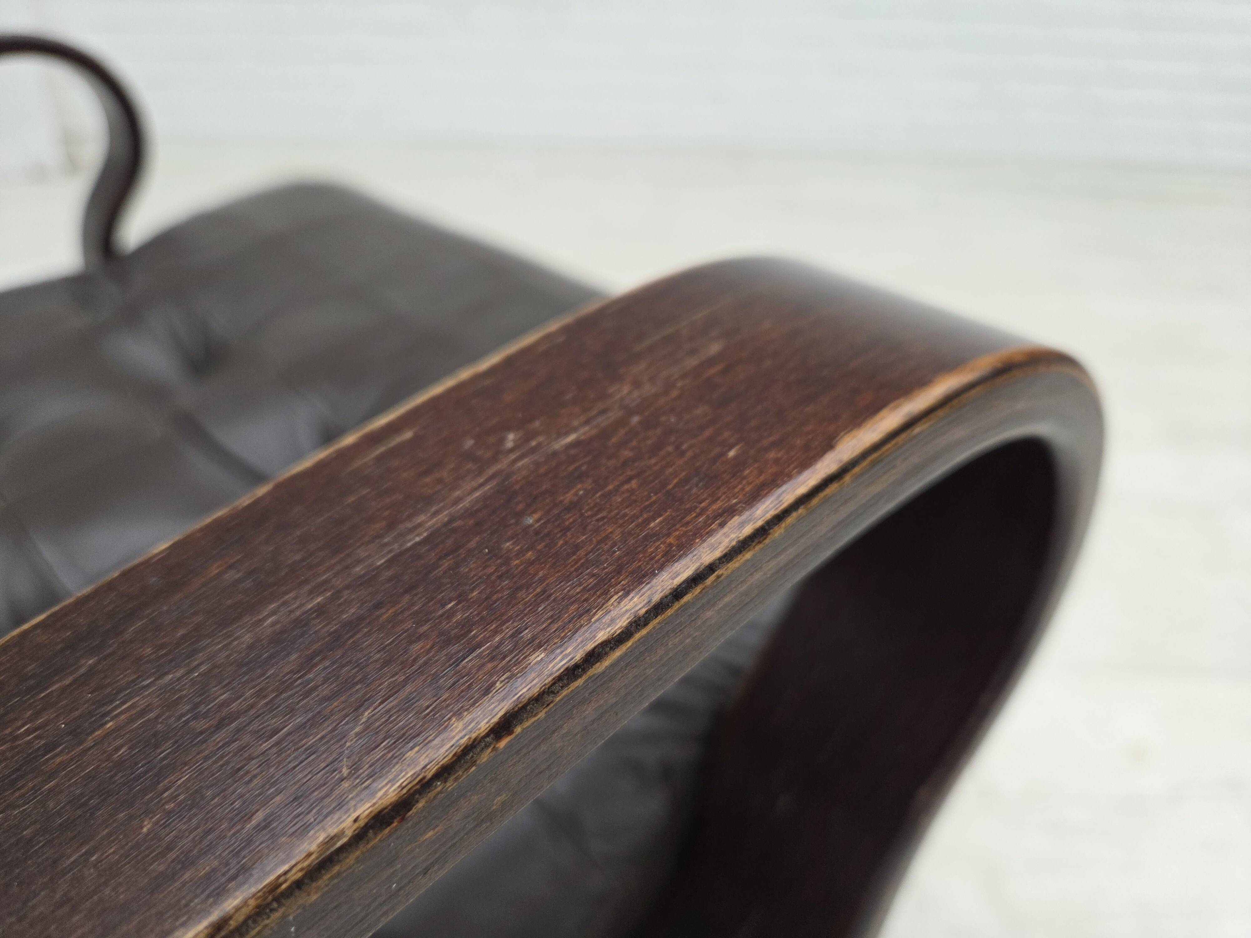 Fauteuil pivotant scandinave des années 1970, en cuir patchwork d'origine.