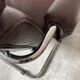 Midcentury tubular chromed chairs with leather cushions