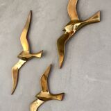 Trio of brass birds