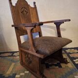 Antique arts and crafts carved oak armchair, 1910
