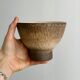 Small vintage cup in rustic glazed stoneware