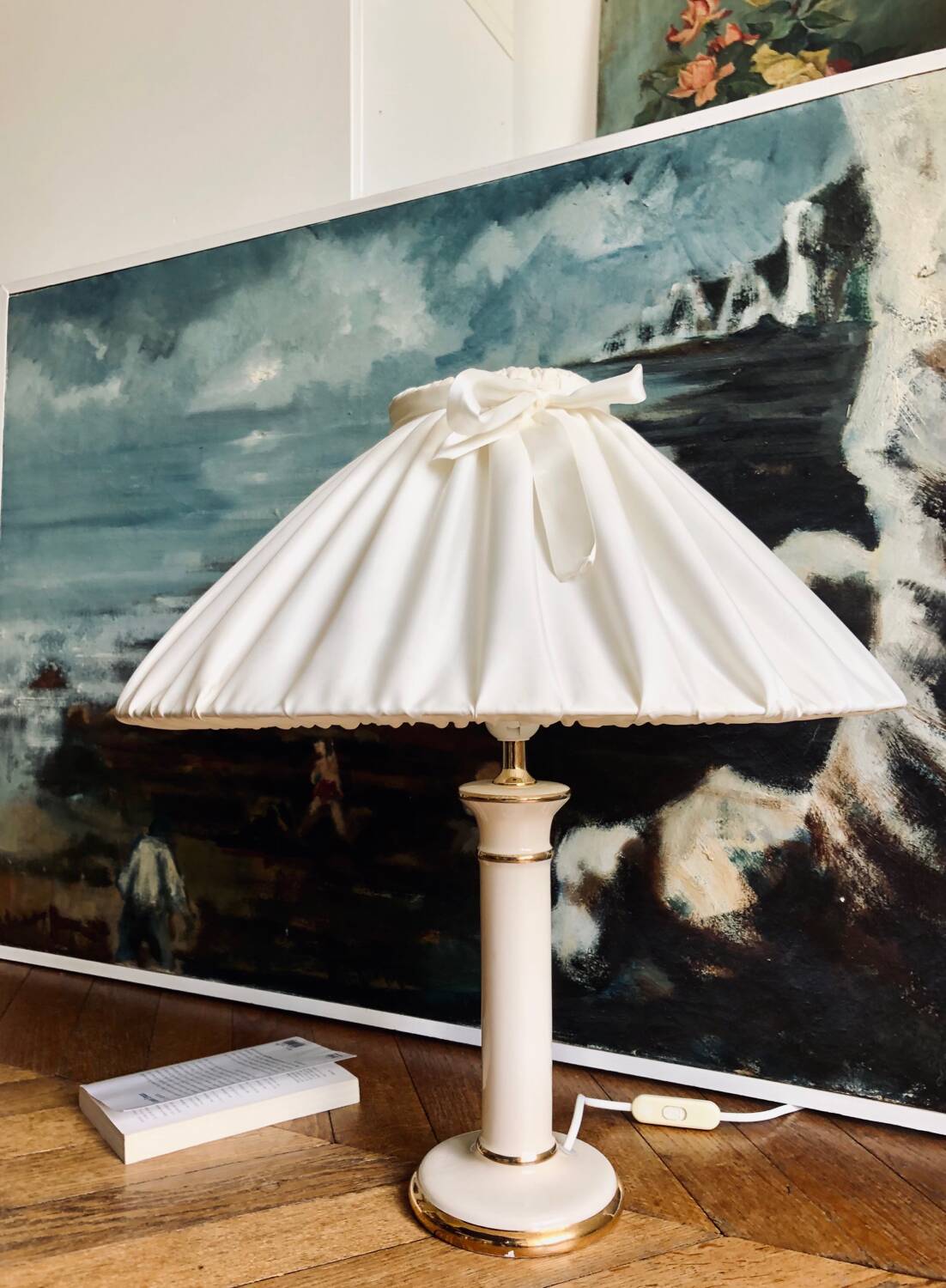 Vintage ivory ceramic lamp with gilding.