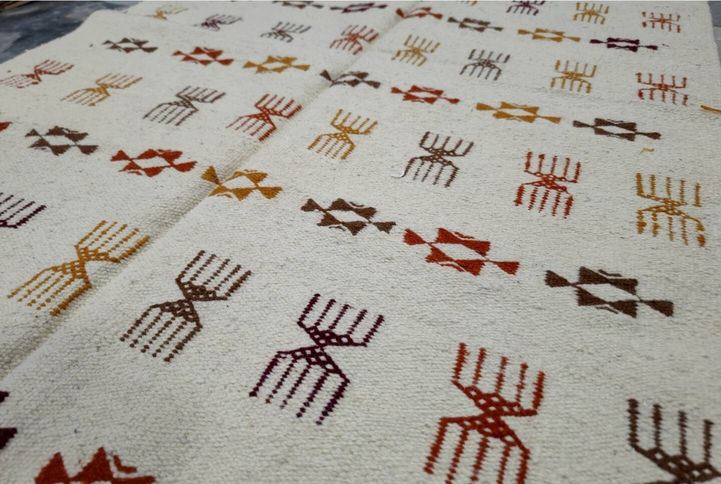 Handmade Berber patterned rug in natural wool