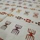 Handmade Berber patterned rug in natural wool