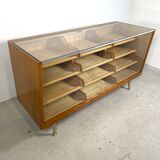 Vintage counter with drawers and glass top