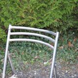 Retractable folding chair