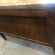 Louis XV style curved black matte commode with gilded bronze ornamentation from the 1950s.