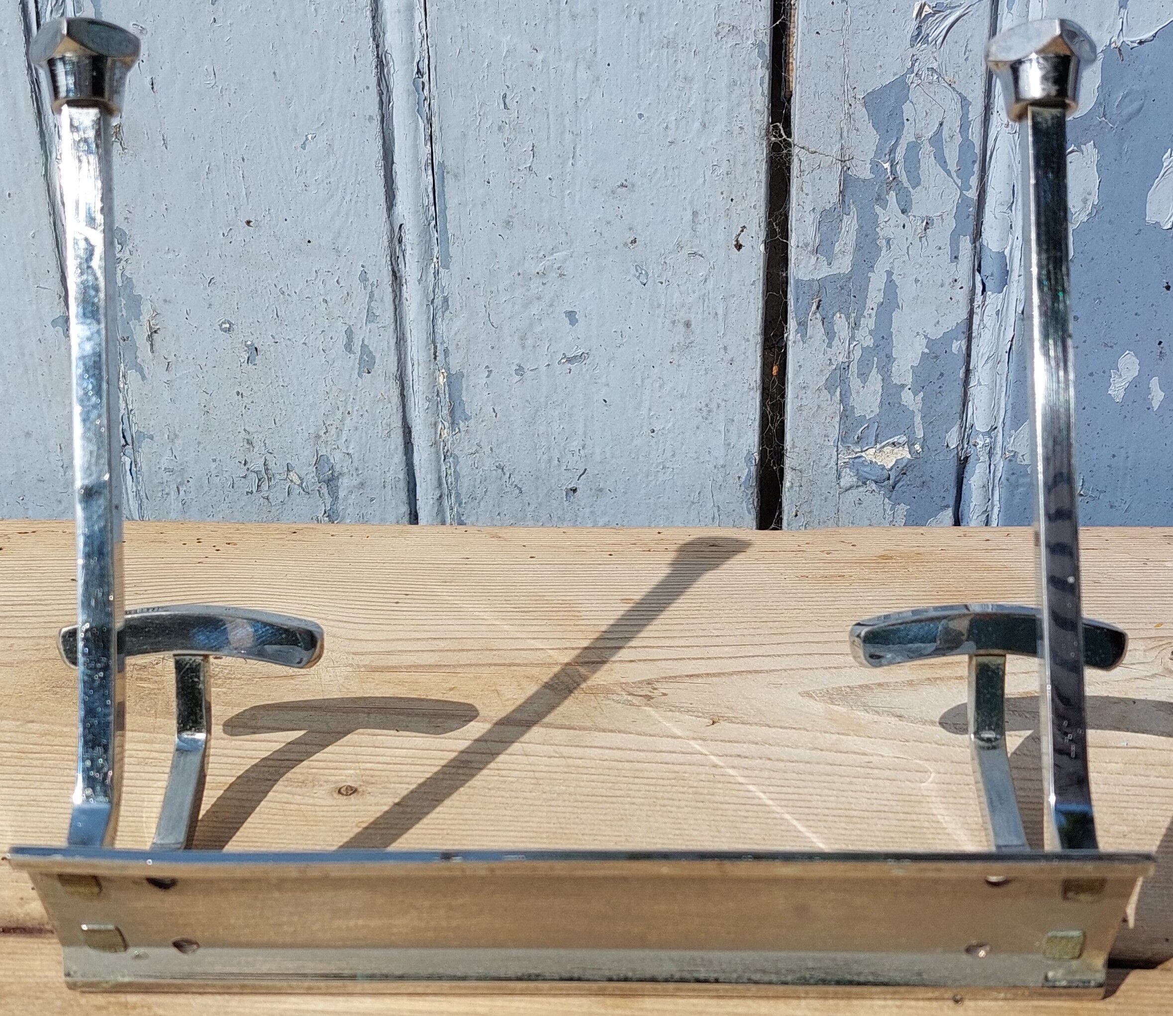 Nickel-plated brass coat rack