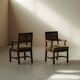 Pair of modernist armchairs in solid oak, France, circa 1940.