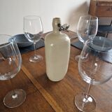 Old bottle of beige sandstone hot water bottle