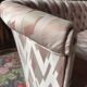 Small vintage 2-seater sofa from the 70s in Hollywood Regency style, satin pink.