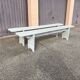 Pair of wooden benches painted white, French artisanal work.
