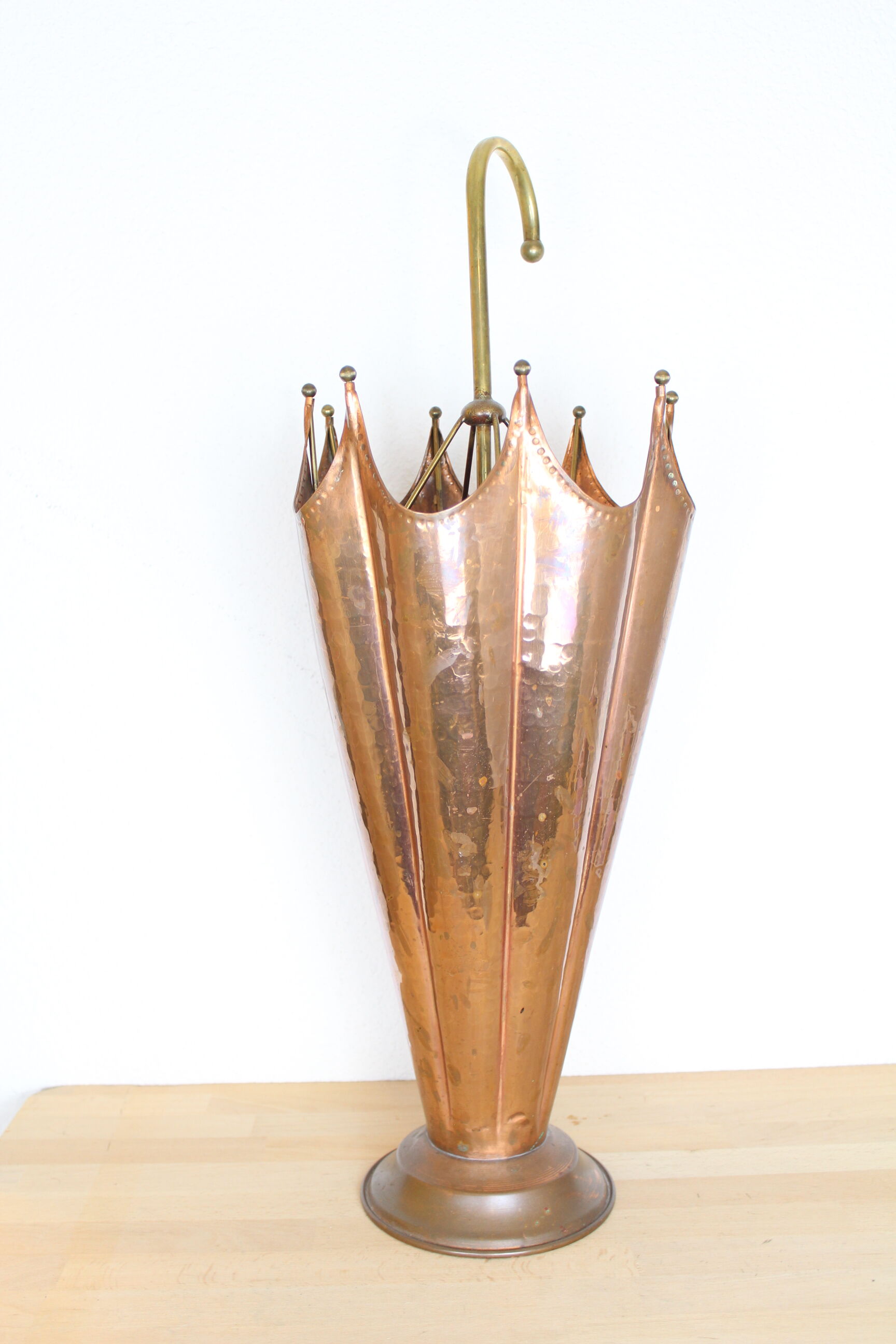 Copper umbrella door