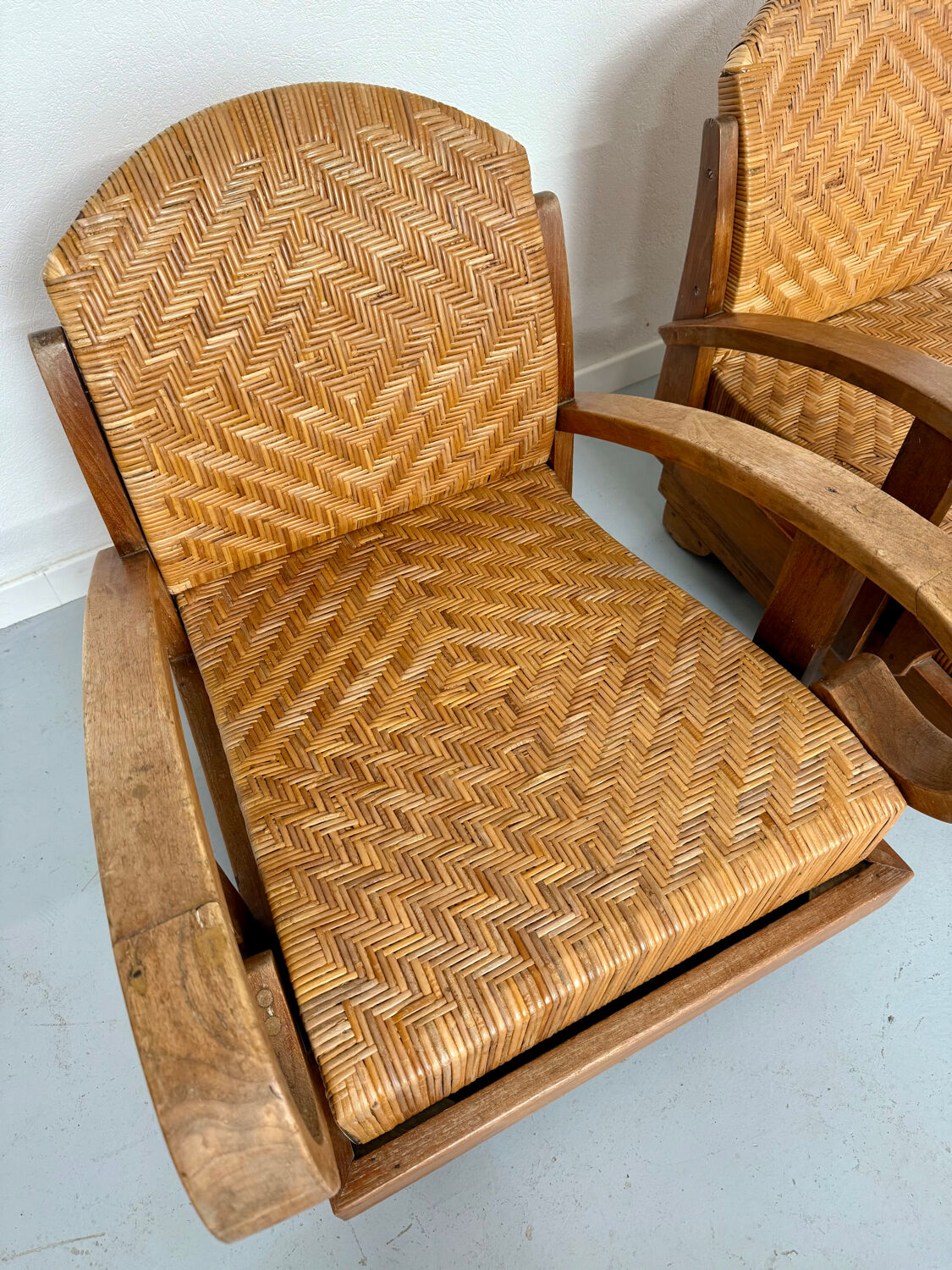 Set of 4 woven rattan armchairs, colonial style, 1950s