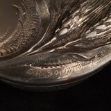 Round Art Nouveau pewter box with floral motifs