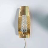 Vintage glass wall sconce from the 1960s in brass, mid-century light.