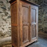 Antique French wardrobe in oak and pine, late 19th century.