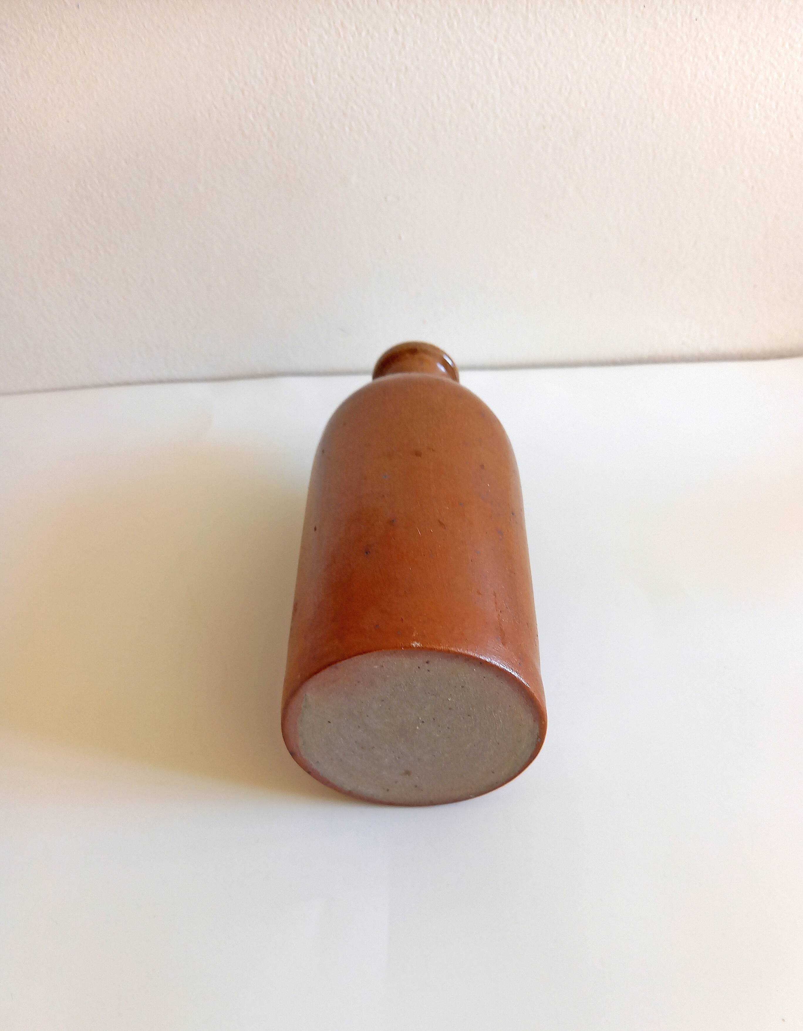 Old vase soliflore in glazed sandstone vintage