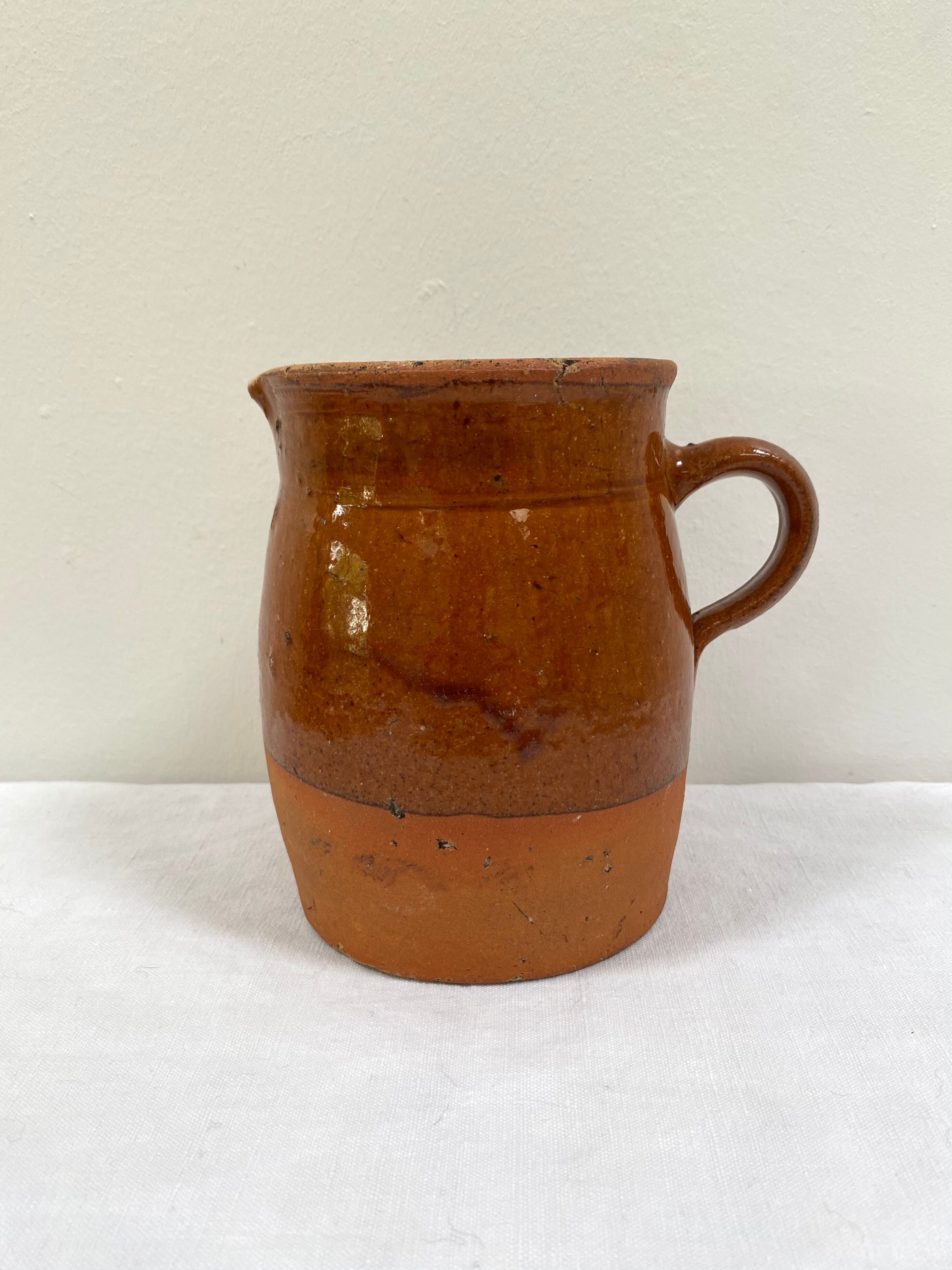 Pitcher old vase in two-tone sandstone