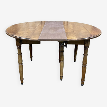Late 19th century Louis Philippe table in cherry wood with 3 attached extensions