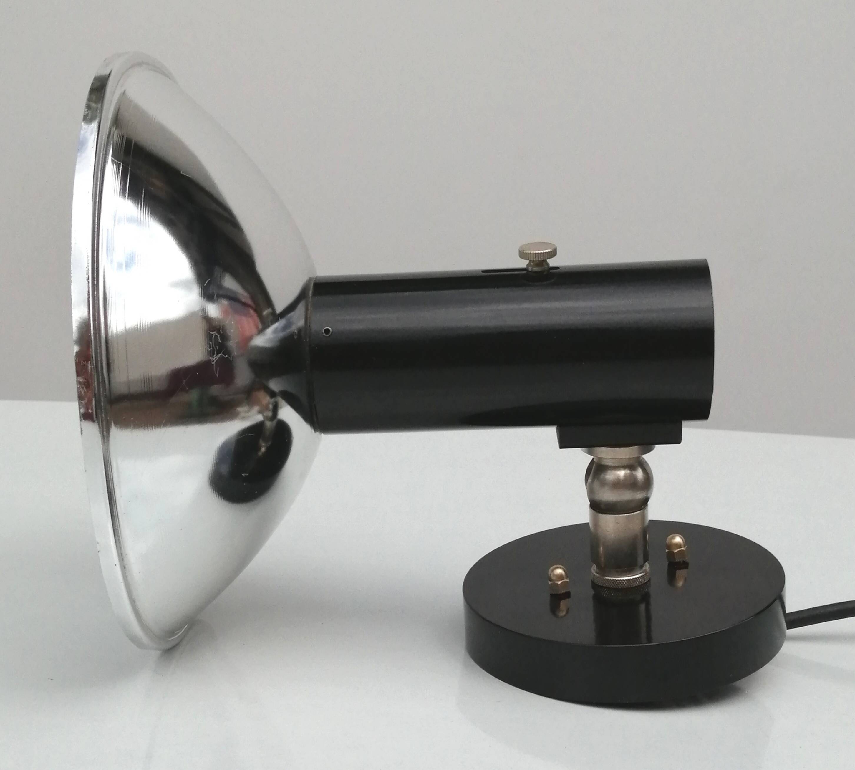 Adjustable black and chrome wall light from Raak, vintage 1960.