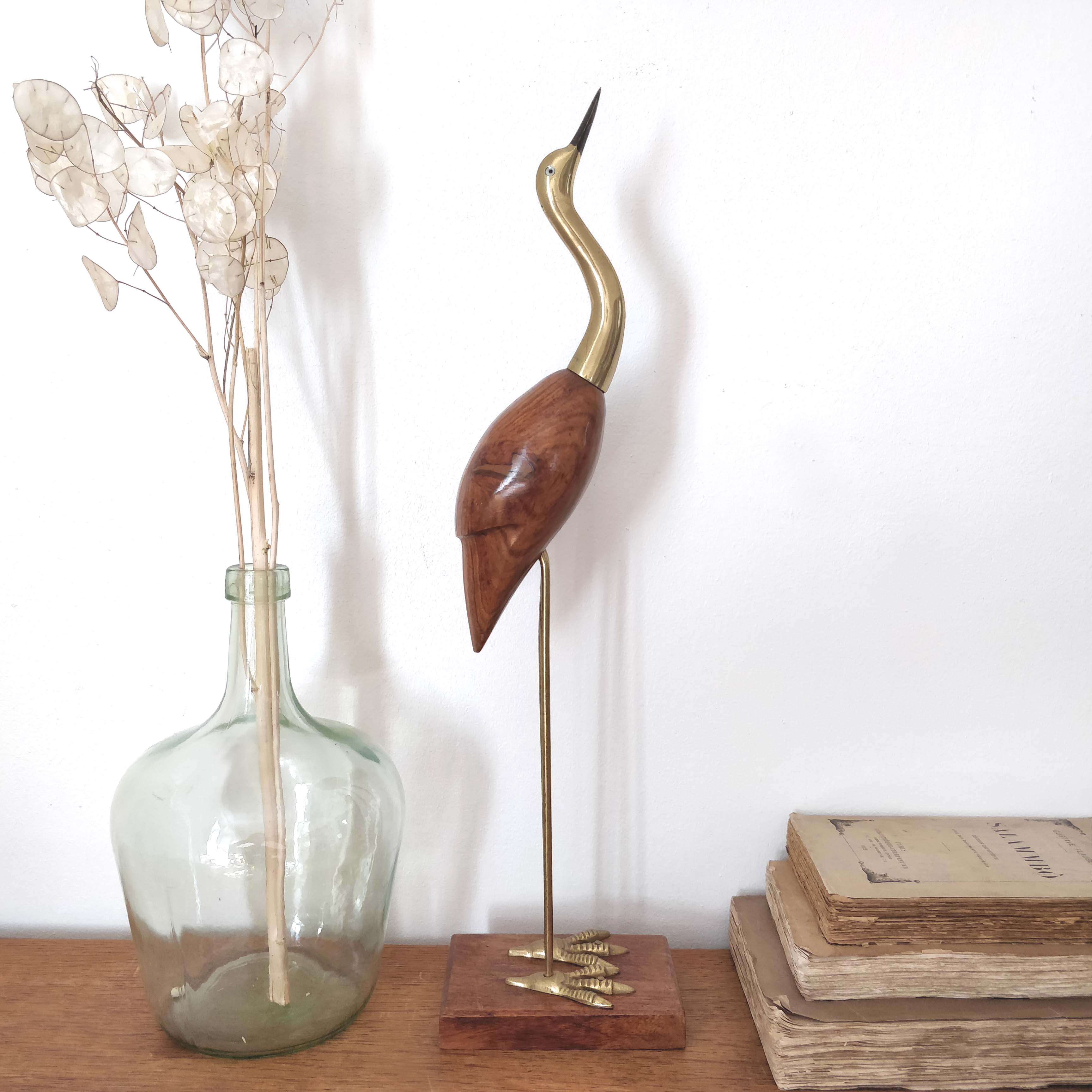 Large wooden and brass heron