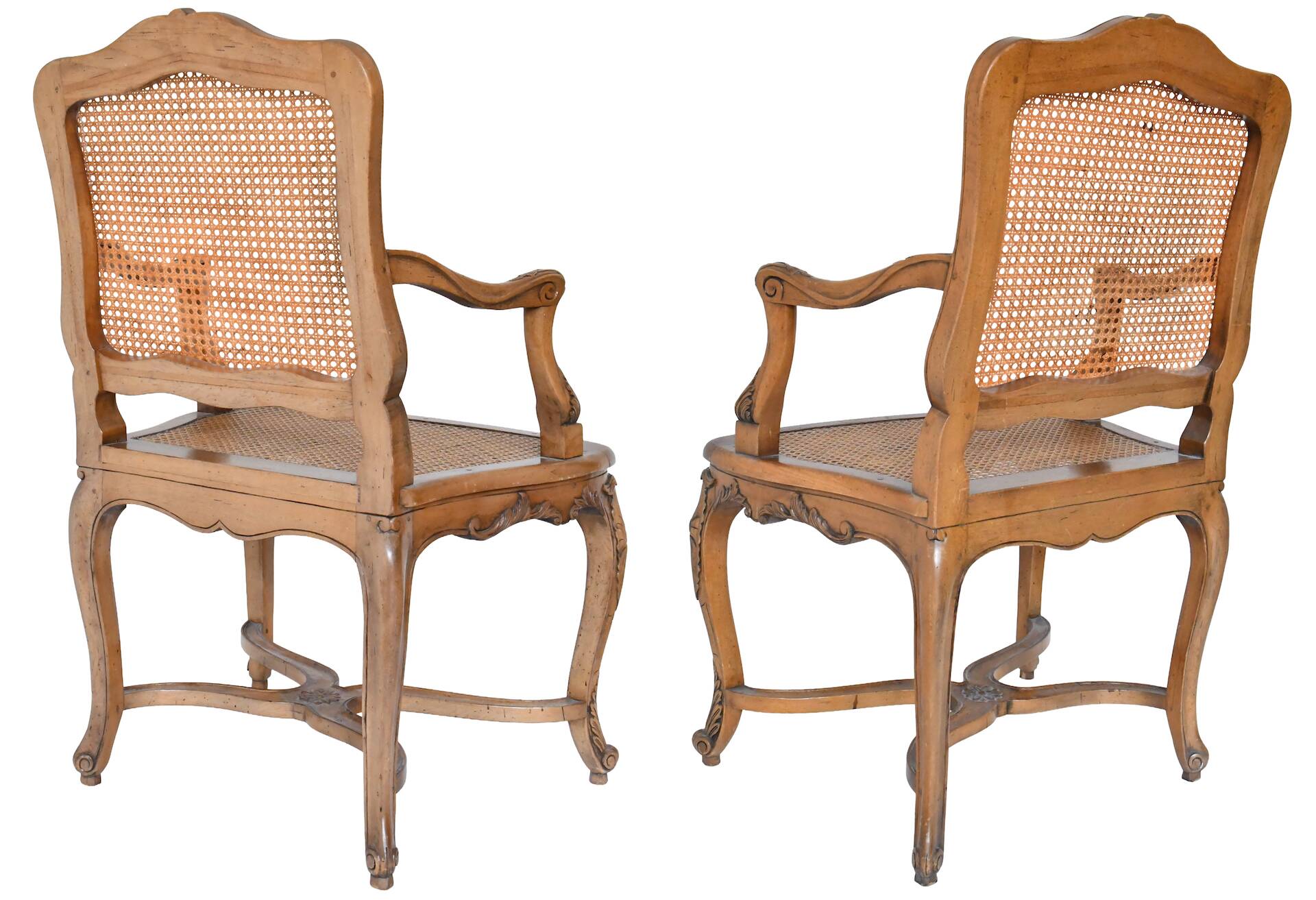 Paire de fauteuils cannés de style Régence