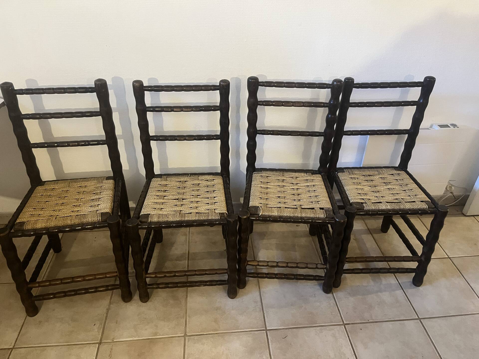 Set of 4 vintage chairs in the style of Charles Dudouyt, made of turned wood and upholstered.