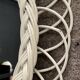 Rattan entrance set with mirror and 2 coat hooks.