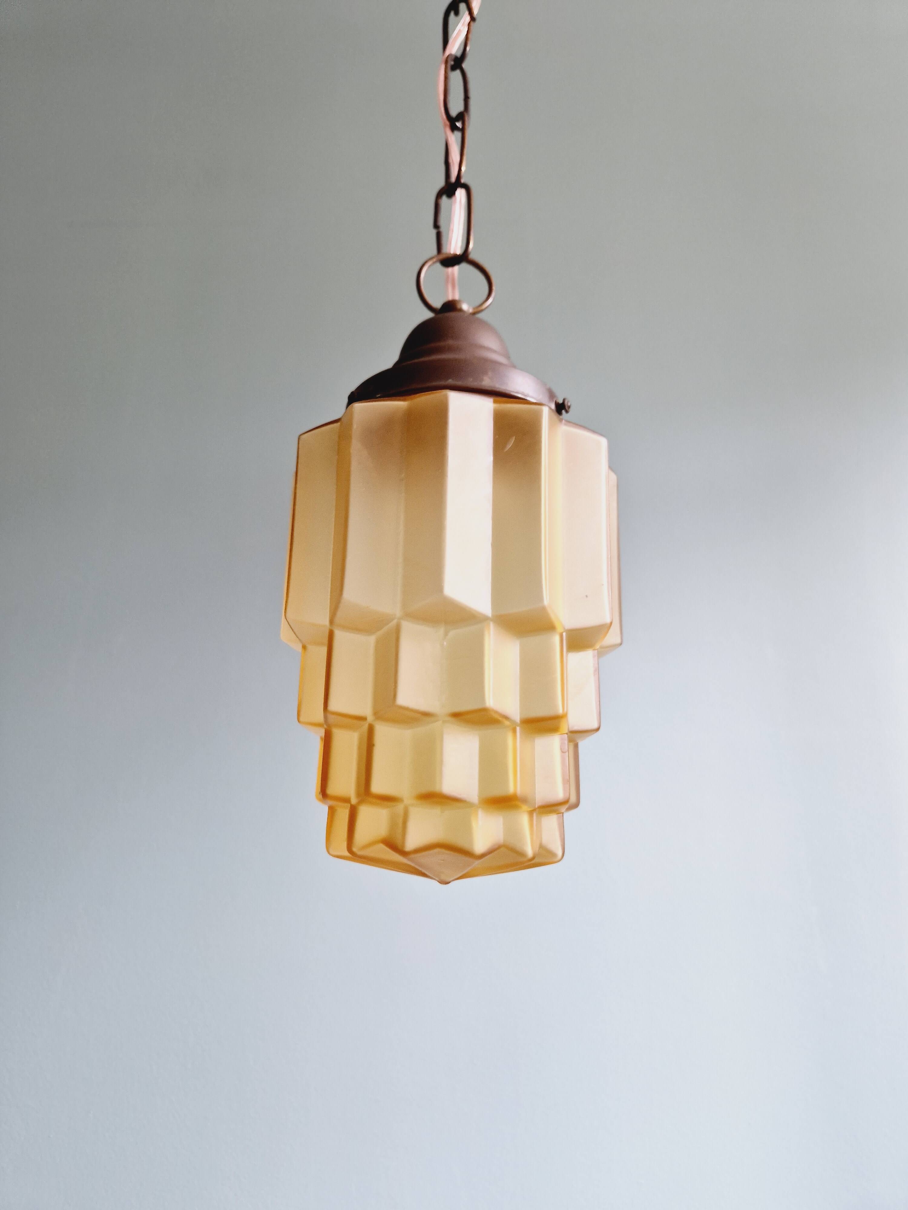 Art Deco Skyscraper type pendant lamp in amber glass, 1920s-30s