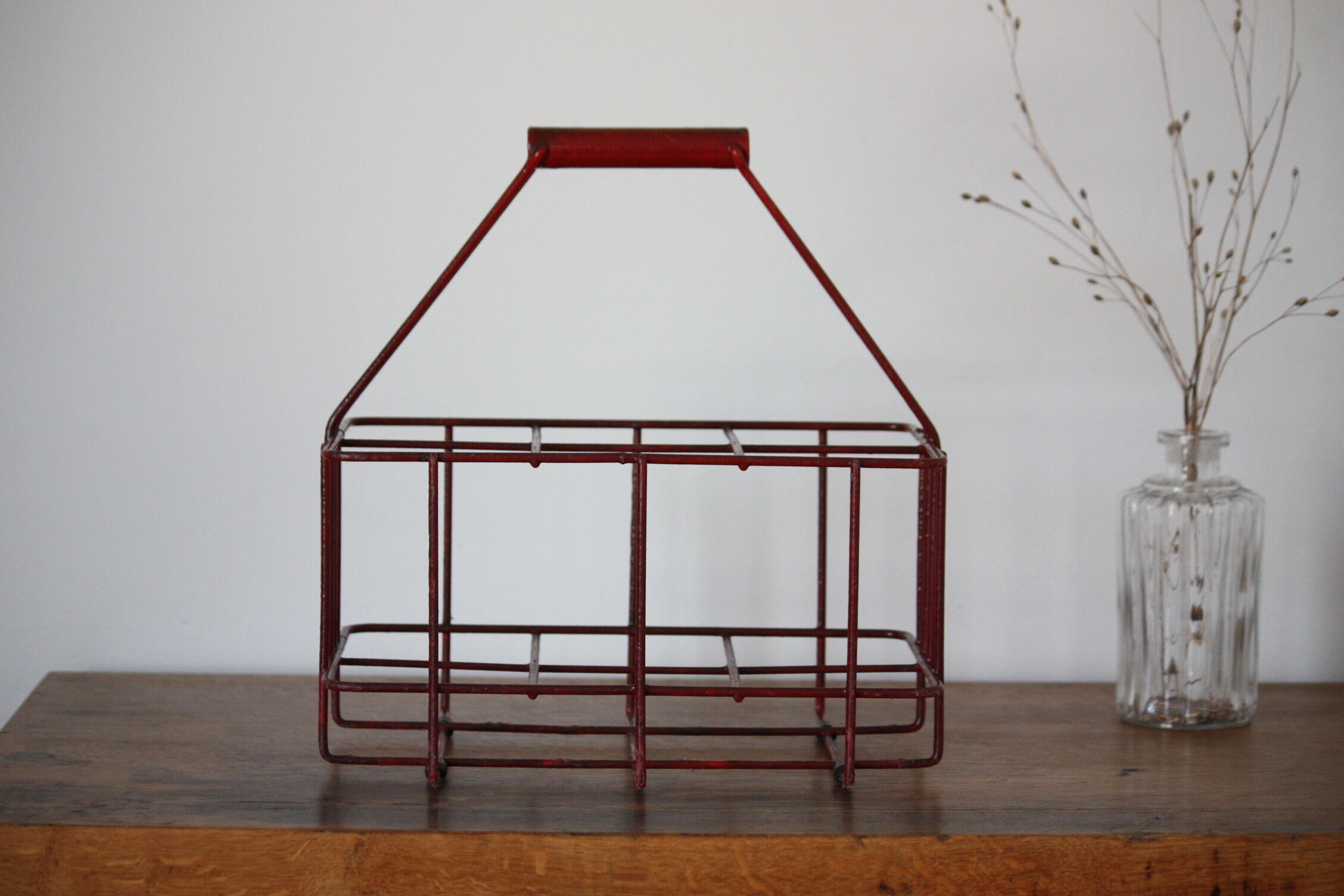 Red metal bottle holder