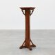 Art Deco oak pedestal with pierced brackets and cross base, Belgium 1920s