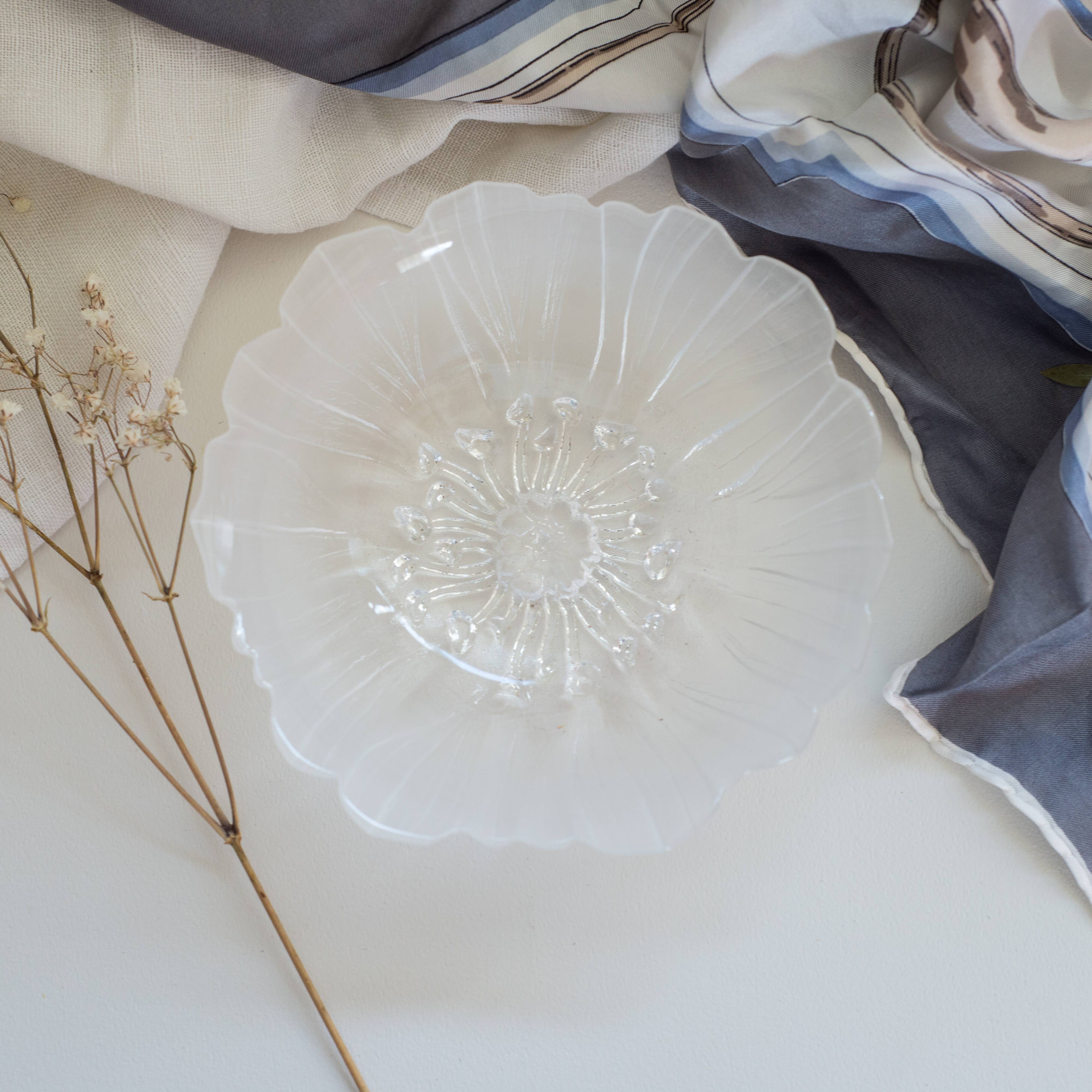 Cup or empty glass flower pocket