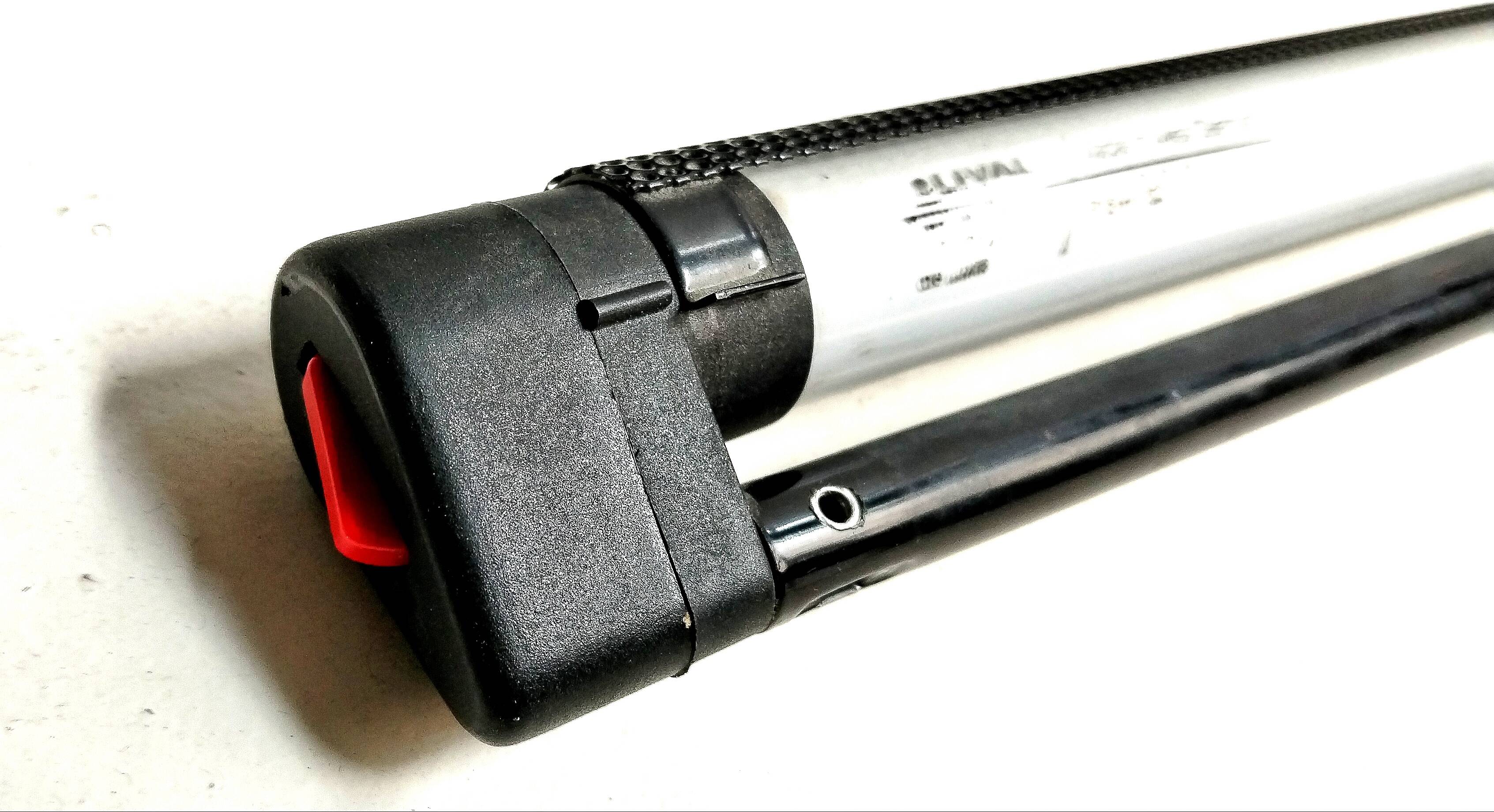 Black lacquered perforated metal table lamp with neon lighting - vintage from the 80s / 90s