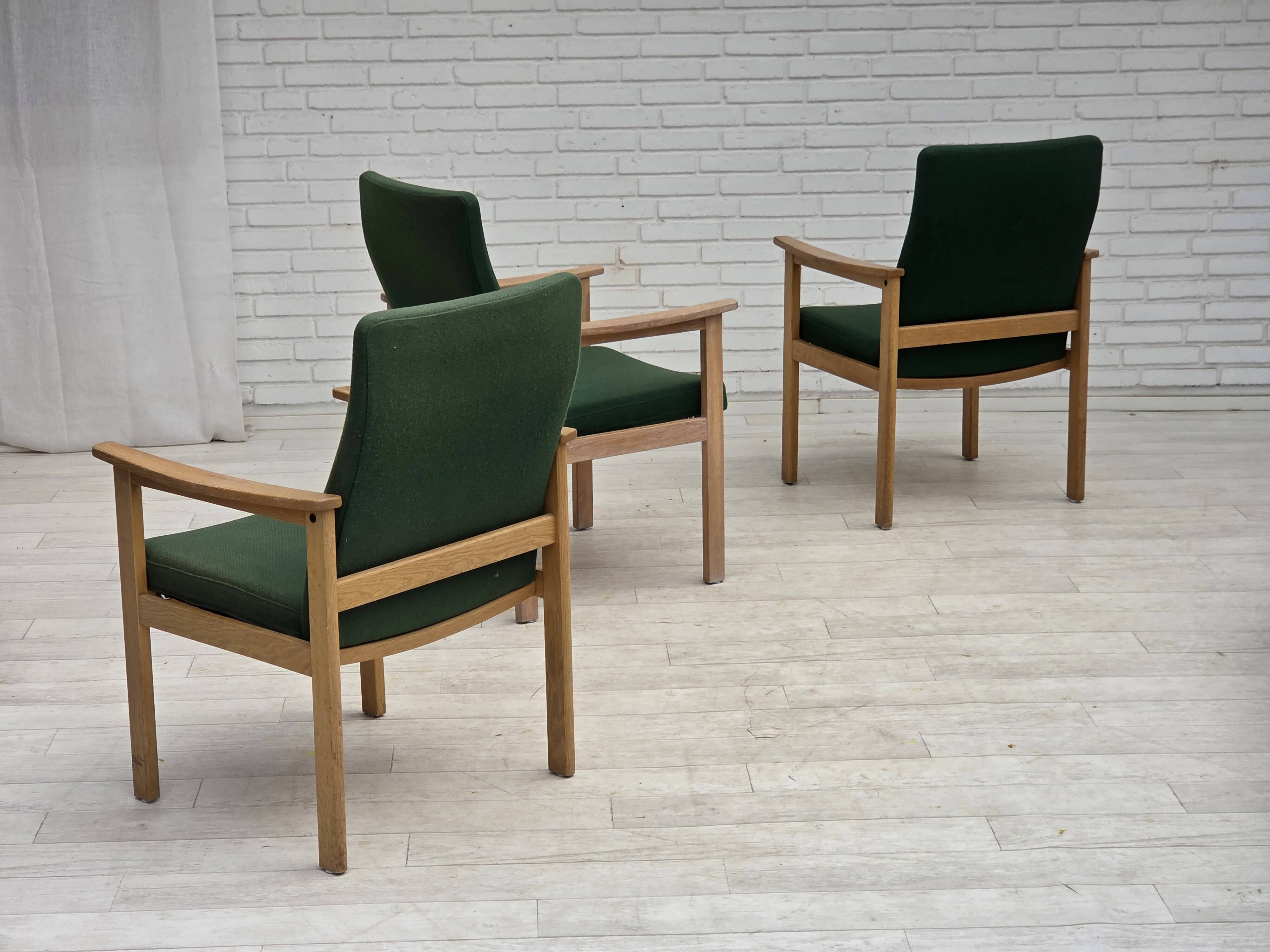 1980s, Danish armchair by Høng Stole, green furniture wool, oak wood.