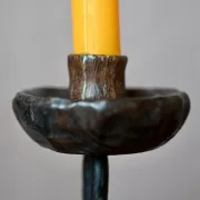 Sculpted wooden and wrought iron brutalist double chandelier from the 1960s.