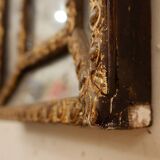 Miroir perlé en bois doré du 18e siècle