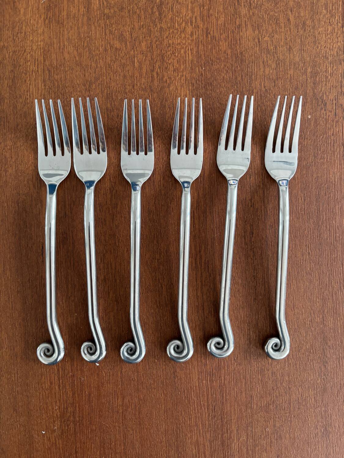 Vintage 24-piece stainless steel cutlery set with spiral handles