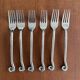 Vintage 24-piece stainless steel cutlery set with spiral handles